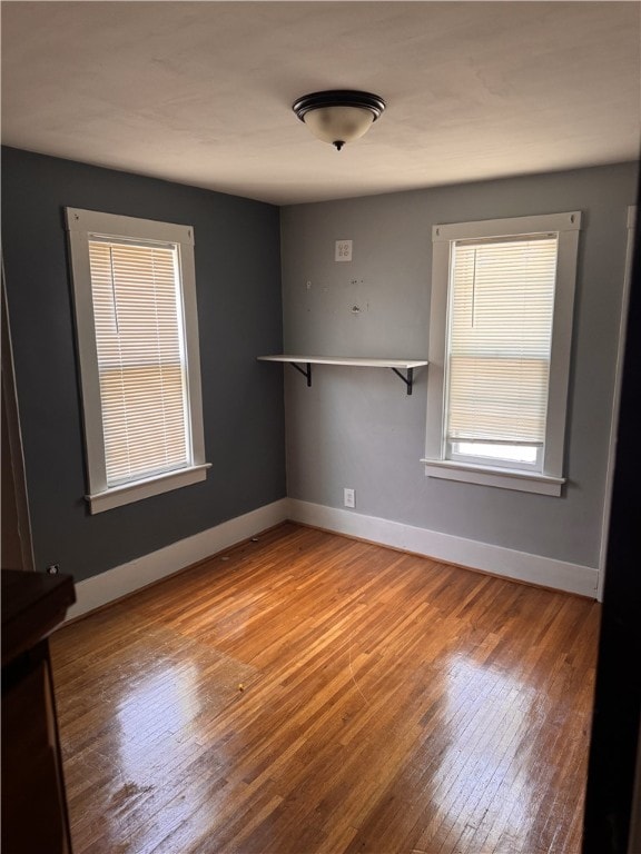 94 Wetmore Park, Rochester, NY 14606 - empty room with wood finished floors and baseboards
