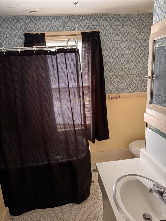94 Wetmore Park, Rochester, NY 14606 - bathroom featuring wallpapered walls, vanity, and tile patterned flooring