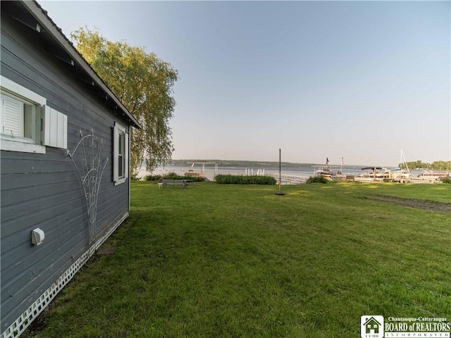 4896 Ashville Bay Rd, North Harmony, NY 14710 - view of green lawn with a water view