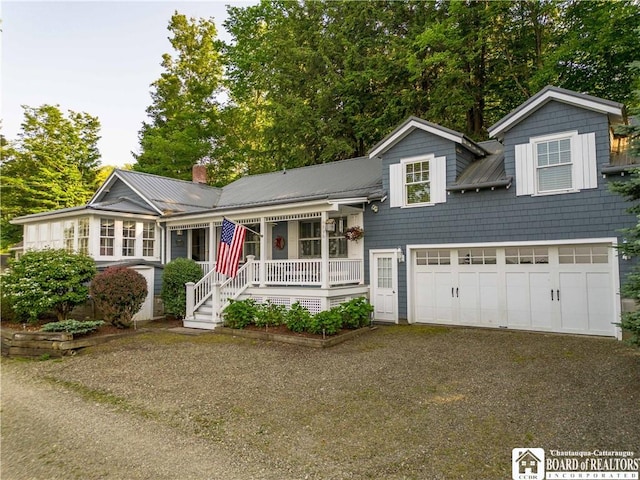 4896 Ashville Bay Rd, North Harmony, NY 14710 - split level home with a chimney, a metal roof, and driveway