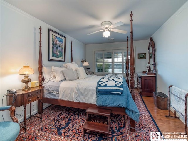 4896 Ashville Bay Rd, North Harmony, NY 14710 - bedroom featuring ornamental molding, wood finished floors, and a ceiling fan