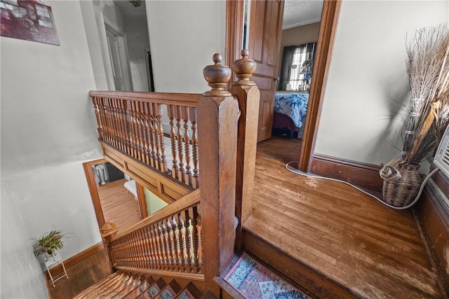 172 E 2nd St, Corning-City, NY 14830 - stairs featuring wood finished floors