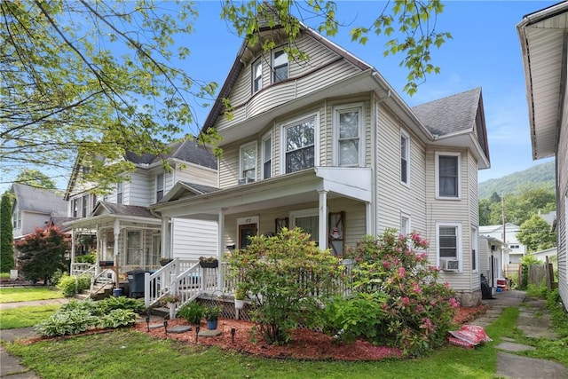 172 E 2nd St, Corning-City, NY 14830 - view of front facade featuring a porch