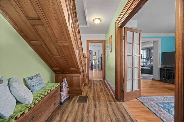 172 E 2nd St, Corning-City, NY 14830 - hall featuring wood finished floors and baseboards