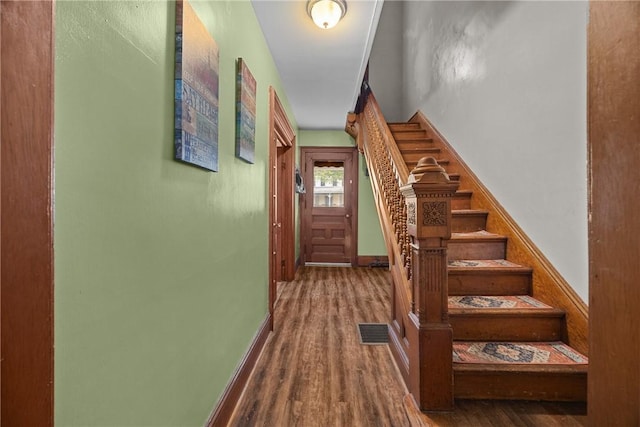 172 E 2nd St, Corning-City, NY 14830 - stairs with wood finished floors and baseboards