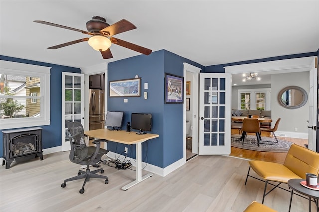 45 Croydon Rd, Rochester, NY 14610 - home office featuring light wood finished floors, french doors, and a chandelier