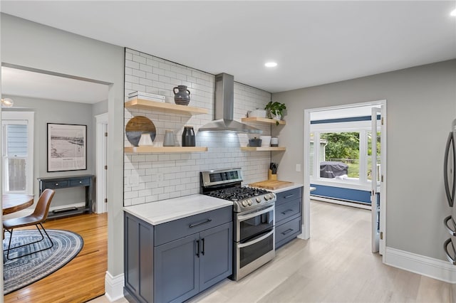 45 Croydon Rd, Rochester, NY 14610 - kitchen with range with two ovens, wall chimney range hood, open shelves, a baseboard heating unit, and light wood-style floors