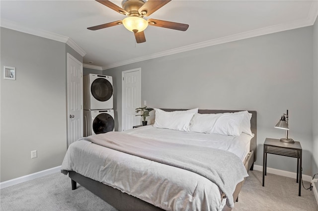 45 Croydon Rd, Rochester, NY 14610 - bedroom featuring stacked washer / dryer, light colored carpet, crown molding, and ceiling fan