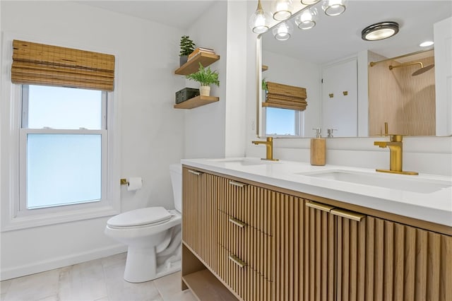 45 Croydon Rd, Rochester, NY 14610 - bathroom with double vanity, tile patterned floors, and a shower