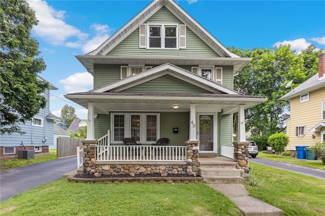 45 Croydon Rd, Rochester, NY 14610 - traditional style home with covered porch and a front lawn