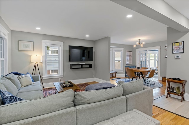 45 Croydon Rd, Rochester, NY 14610 - living room featuring a chandelier, light wood-style floors, and recessed lighting