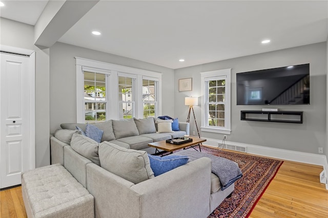 45 Croydon Rd, Rochester, NY 14610 - living room featuring light wood-type flooring and recessed lighting