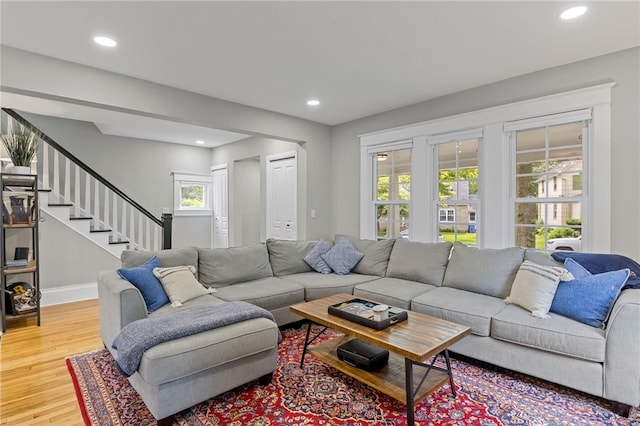 45 Croydon Rd, Rochester, NY 14610 - living room with wood finished floors, recessed lighting, and stairs