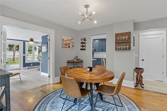 45 Croydon Rd, Rochester, NY 14610 - dining space featuring light wood finished floors, a chandelier, a baseboard heating unit, and ceiling fan