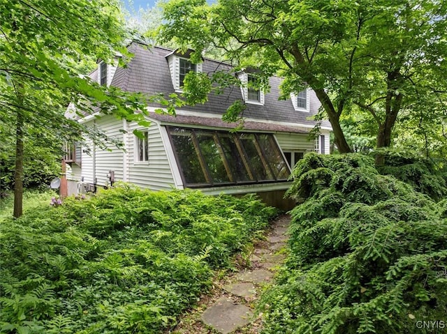 13 Dodd St, Whitestown, NY 13492 - rear view of house featuring a sunroom