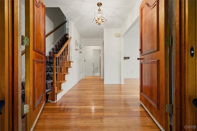 13 Dodd St, Whitestown, NY 13492 - entryway featuring stairs, a chandelier, and light wood-type flooring