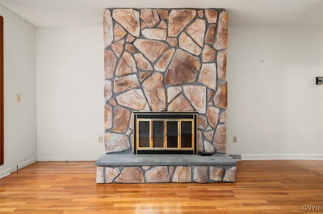 13 Dodd St, Whitestown, NY 13492 - detailed view of wood finished floors and a fireplace