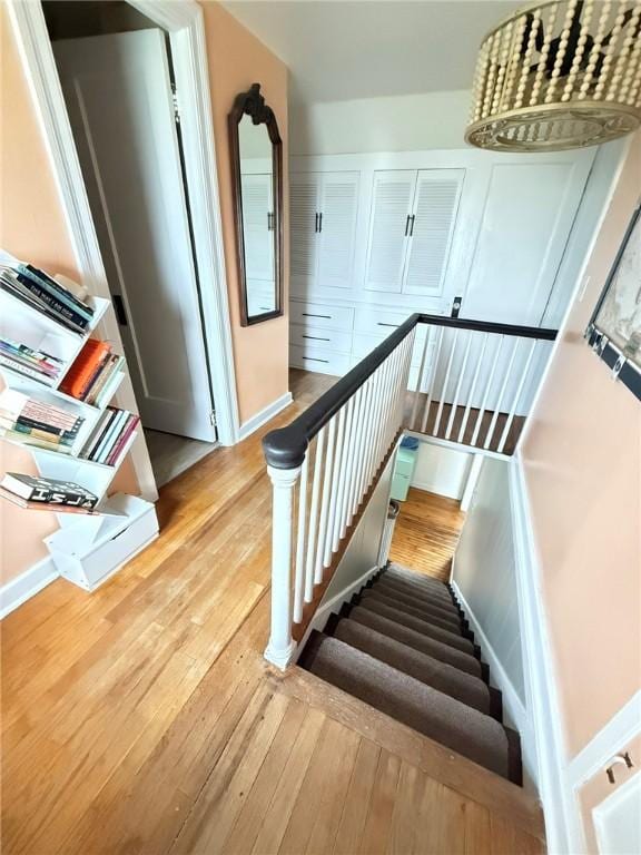114 W Main St, Sidney, NY 13838 - stairway with hardwood / wood-style floors and baseboards