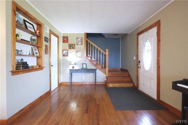 19536 State Route 3, Hounsfield, NY 13601 - foyer with hardwood / wood-style floors, stairway, and crown molding