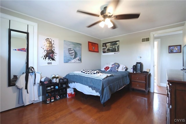 19536 State Route 3, Hounsfield, NY 13601 - bedroom with dark wood-style flooring, crown molding, and a ceiling fan