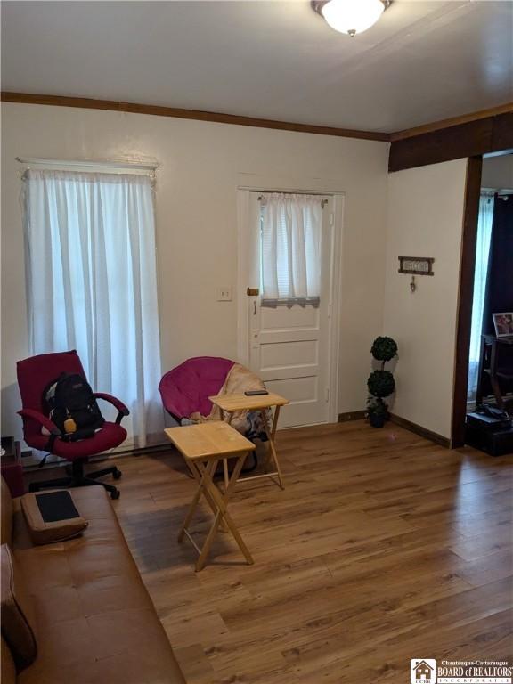 650 Barrows St, Jamestown, NY 14701 - entrance foyer featuring light wood-style flooring and crown molding