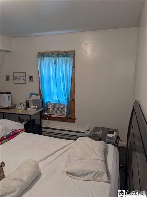 650 Barrows St, Jamestown, NY 14701 - bedroom with baseboard heating and cooling unit