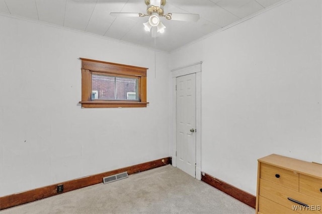 709 87th St, Niagara Falls, NY 14304 - carpeted spare room with ceiling fan and crown molding