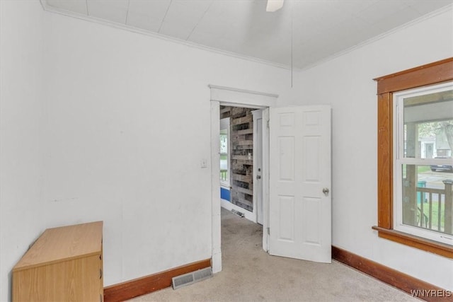 709 87th St, Niagara Falls, NY 14304 - empty room with light carpet and ornamental molding