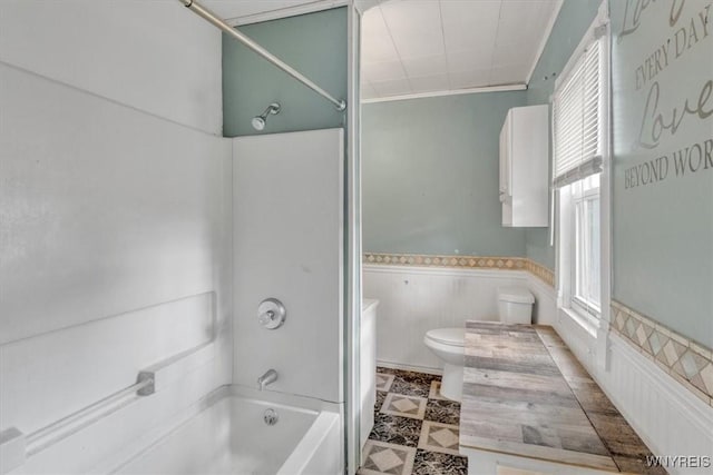 709 87th St, Niagara Falls, NY 14304 - bathroom with bathtub / shower combination and a wainscoted wall