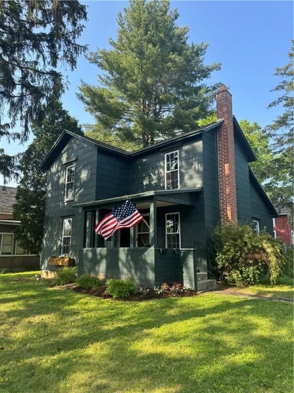201 Sheppard St, Milo, NY 14527 - back of property featuring a yard and a chimney