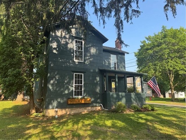 201 Sheppard St, Milo, NY 14527 - back of property featuring a lawn and a chimney