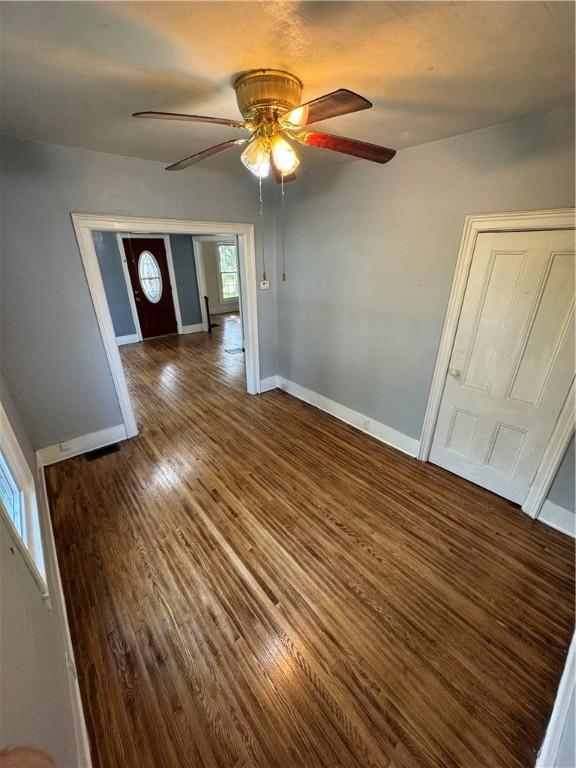 201 Sheppard St, Milo, NY 14527 - unfurnished living room with wood finished floors and ceiling fan