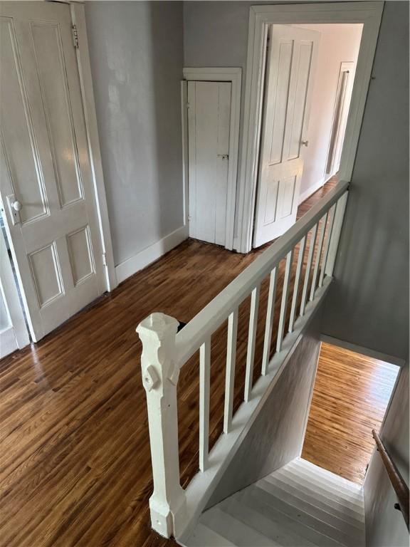 201 Sheppard St, Milo, NY 14527 - staircase with wood finished floors and baseboards