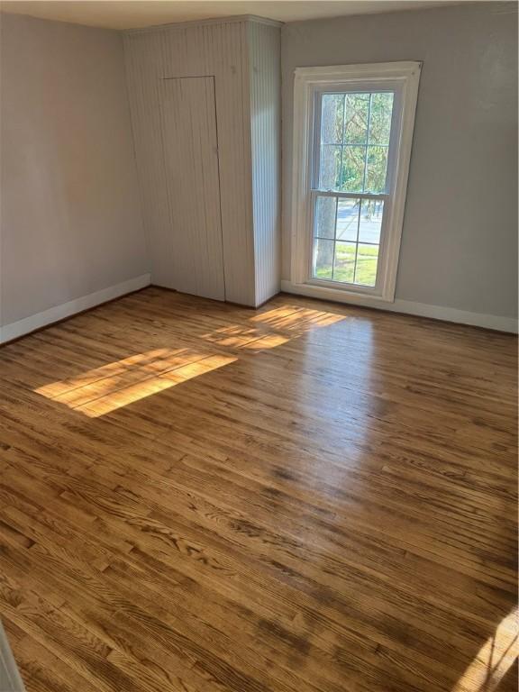 201 Sheppard St, Milo, NY 14527 - spare room featuring wood finished floors and baseboards