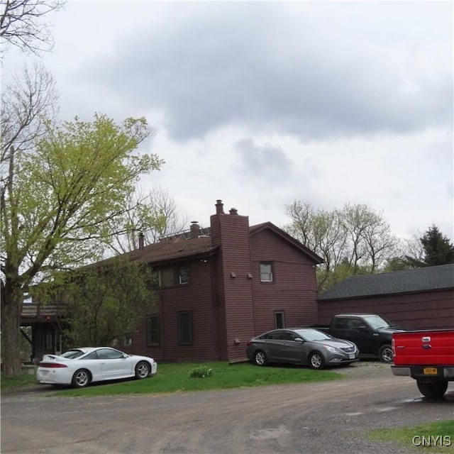3903 Lafayette Rd, Lafayette, NY 13078 - view of side of property with a chimney