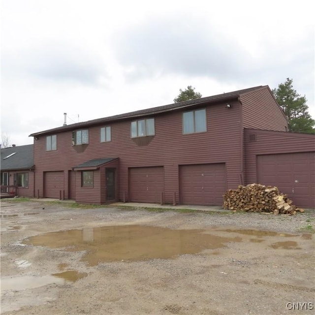 3903 Lafayette Rd, Lafayette, NY 13078 - view of front of house featuring an attached garage and driveway