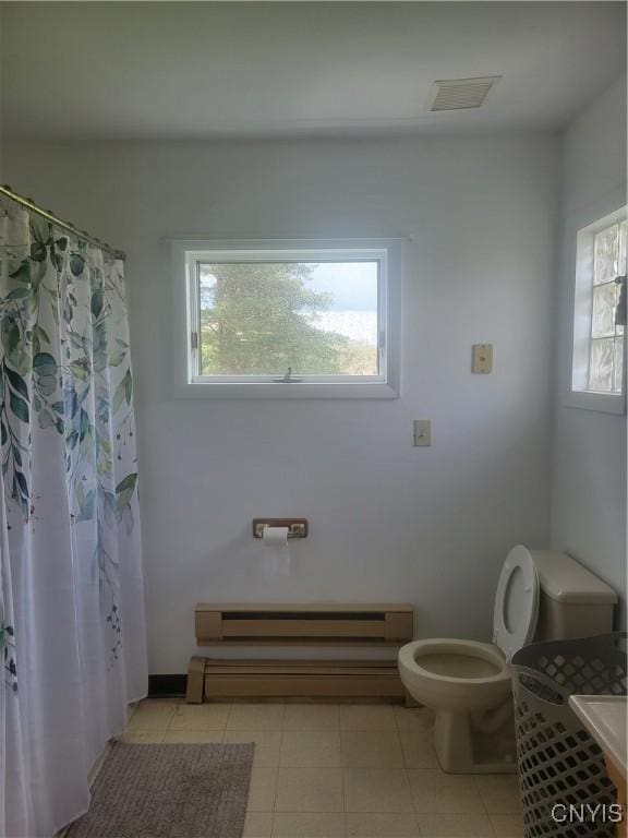 3903 Lafayette Rd, Lafayette, NY 13078 - bathroom with a baseboard heating unit, plenty of natural light, and a baseboard radiator