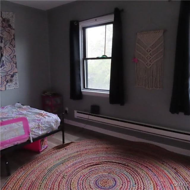 3903 Lafayette Rd, Lafayette, NY 13078 - bedroom featuring a baseboard radiator and baseboards