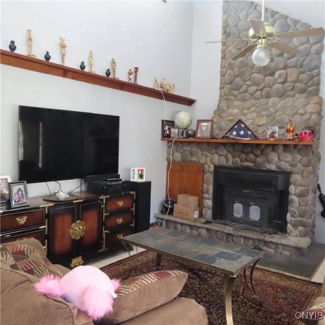 3903 Lafayette Rd, Lafayette, NY 13078 - living area with ceiling fan and a stone fireplace