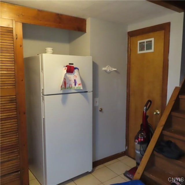 3903 Lafayette Rd, Lafayette, NY 13078 - kitchen featuring freestanding refrigerator and light tile patterned flooring