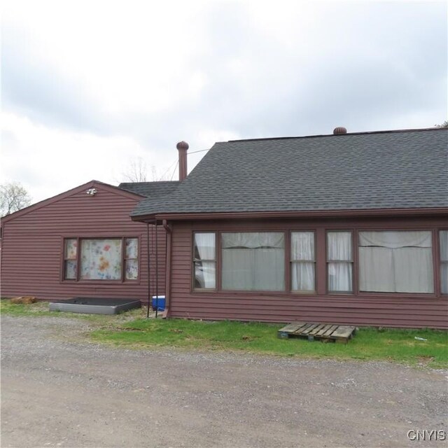 3903 Lafayette Rd, Lafayette, NY 13078 - rear view of house featuring roof with shingles