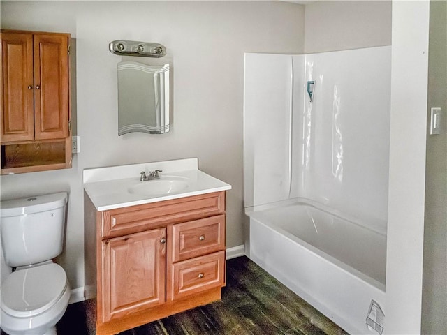 46946 Dingman Point Rd, Alexandria, NY 13607 - full bath with vanity, wood finished floors, and washtub / shower combination