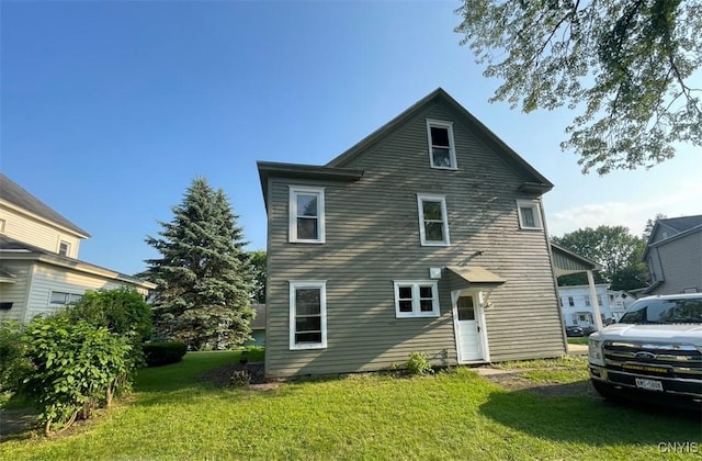 551/2 N Helmer Ave, Manheim, NY 13329 - rear view of house featuring a yard