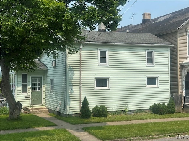 1110 Orchard St, Utica, NY 13502 - view of side of home featuring entry steps