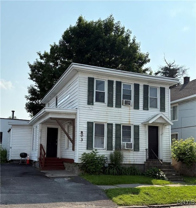 803 Oswego St, Utica, NY 13502 - view of front of home with entry steps and cooling unit