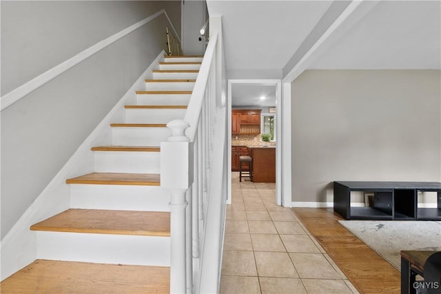 7698 Anchor Dr, Clay, NY 13090 - staircase with tile patterned flooring