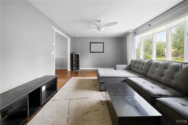 7698 Anchor Dr, Clay, NY 13090 - living room featuring ceiling fan and wood finished floors