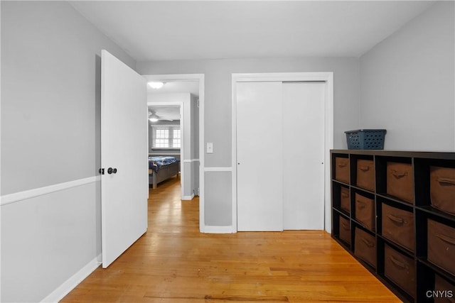 7698 Anchor Dr, Clay, NY 13090 - unfurnished bedroom featuring light wood-style floors and a closet