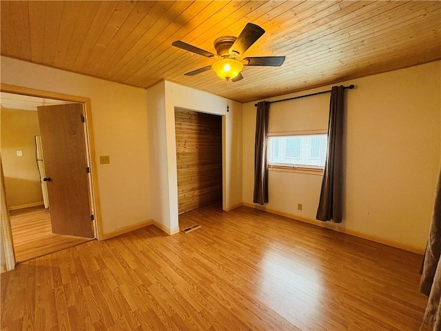216 W William St Unit 201, Corning-City, NY 14830 - unfurnished bedroom with wooden ceiling, a closet, light wood-style floors, and ceiling fan