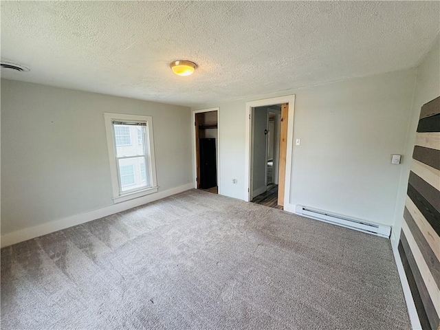 216 W William St Unit 201, Corning-City, NY 14830 - unfurnished bedroom with a baseboard heating unit, carpet floors, and a textured ceiling